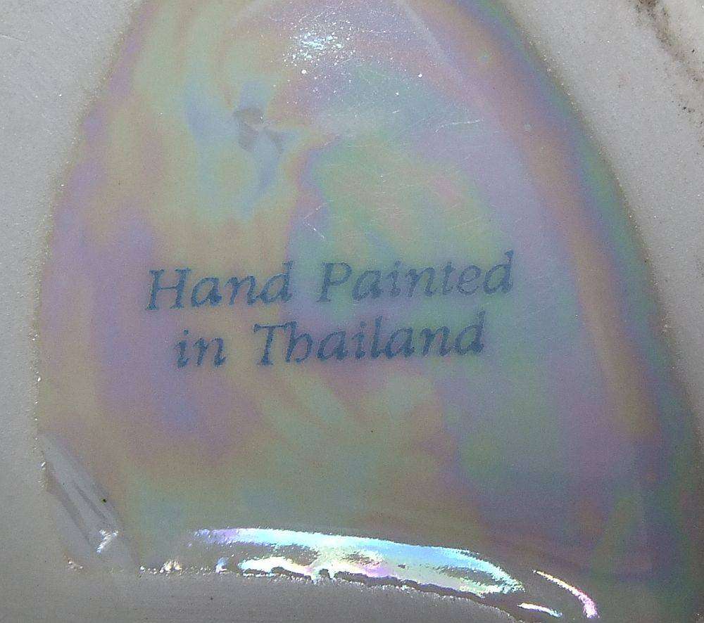 An adorable vintage hand painted porcelain kitty cat themed drink set with rainbow lustre