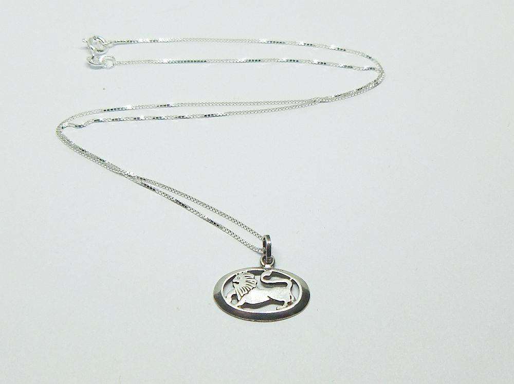 A vintage sterling silver Leo lion Zodiac pendant plus sterling silver necklace