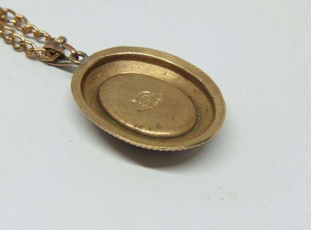 A lovely vintage rolled gold Thomas L Mott pendant with lady theme plus free plated necklace