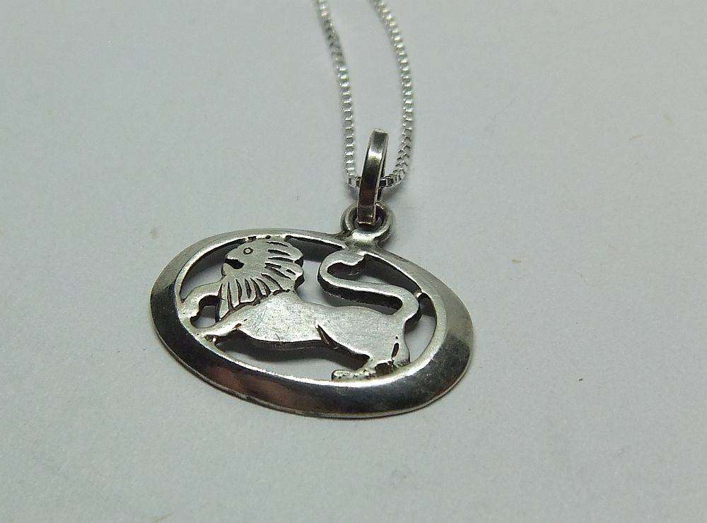 A vintage sterling silver Leo lion Zodiac pendant plus sterling silver necklace