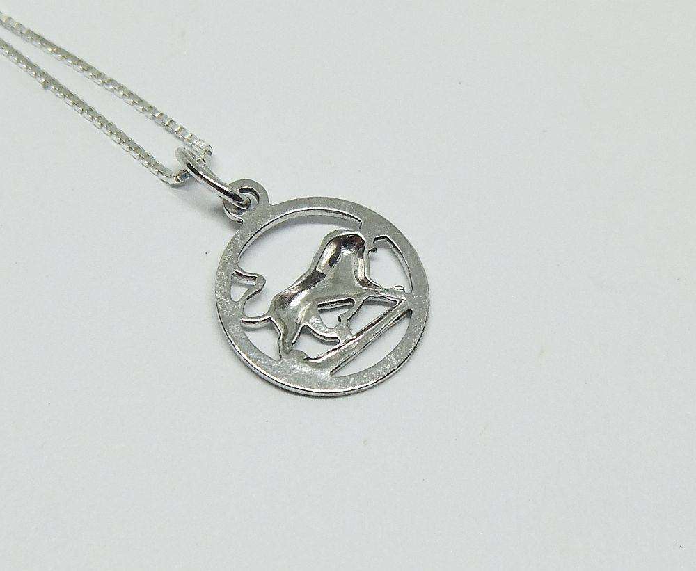 A vintage German 835 silver Leo lion Zodiac sign pendant with a sterling silver necklace