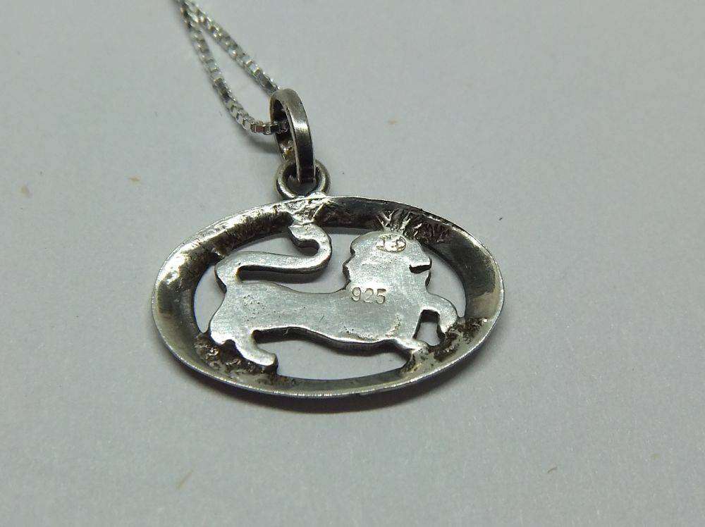 A vintage sterling silver Leo lion Zodiac pendant plus sterling silver necklace
