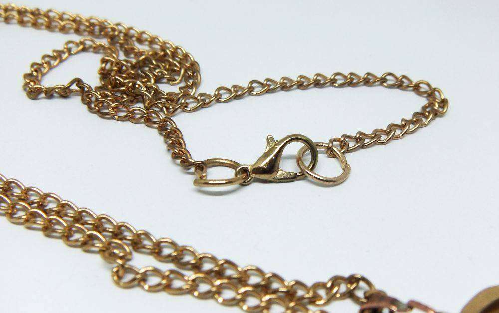 A lovely vintage rolled gold Thomas L Mott pendant with lady theme plus free plated necklace