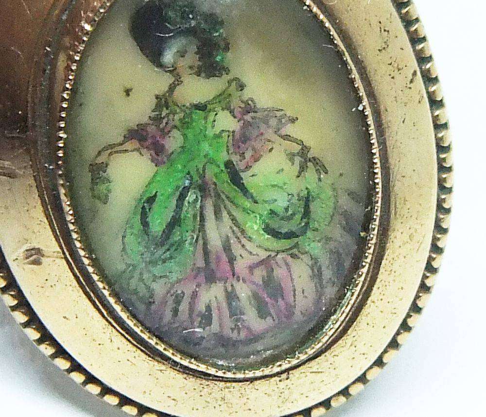 A lovely vintage rolled gold Thomas L Mott pendant with lady theme plus free plated necklace