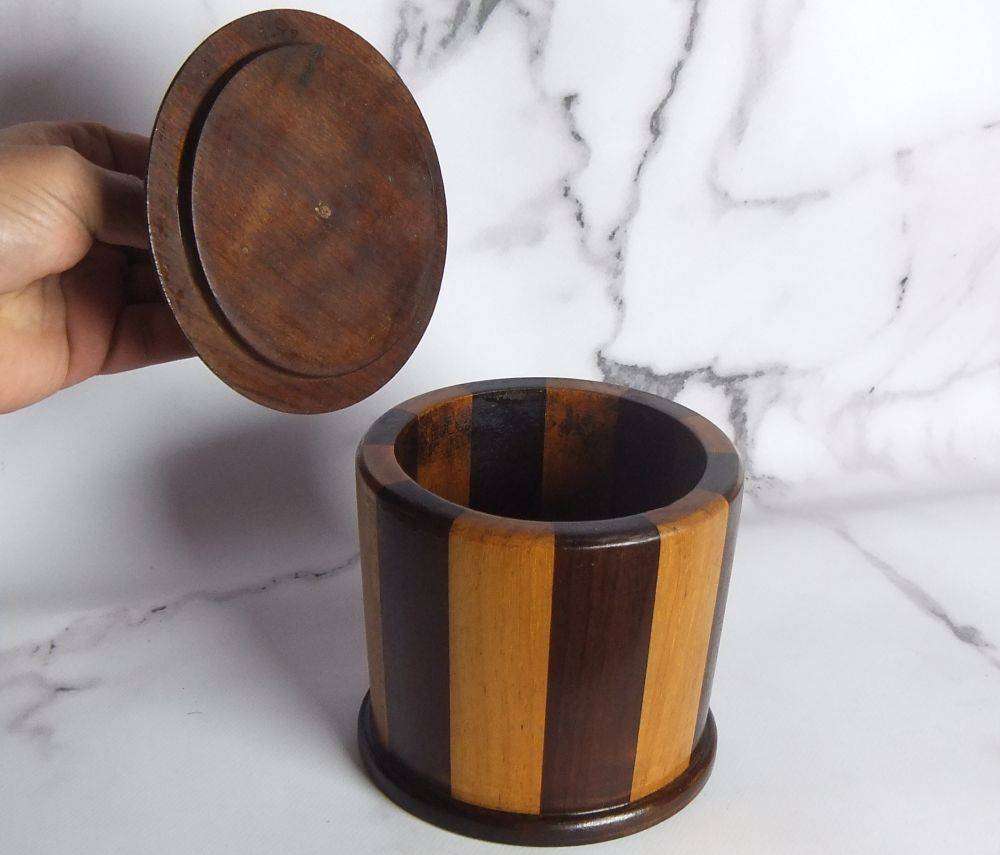 A grand assortment of vintage pipe smokers accessories including tobacco jar , pipe stand and more