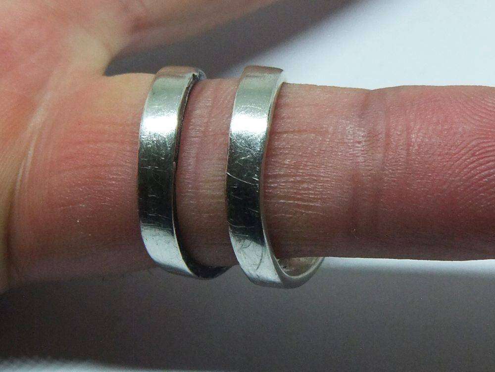 A very unusual sterling silver spiral form ring with designer stamp