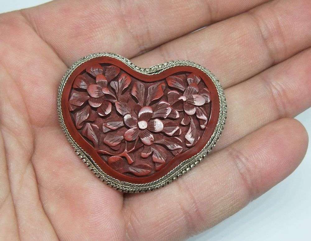 SUPER RARE !! AN OLD CHINESE METAL BROOCH WITH A HAND CARVED HEART SHAPED CINNABAR INSET !! WOW !!
