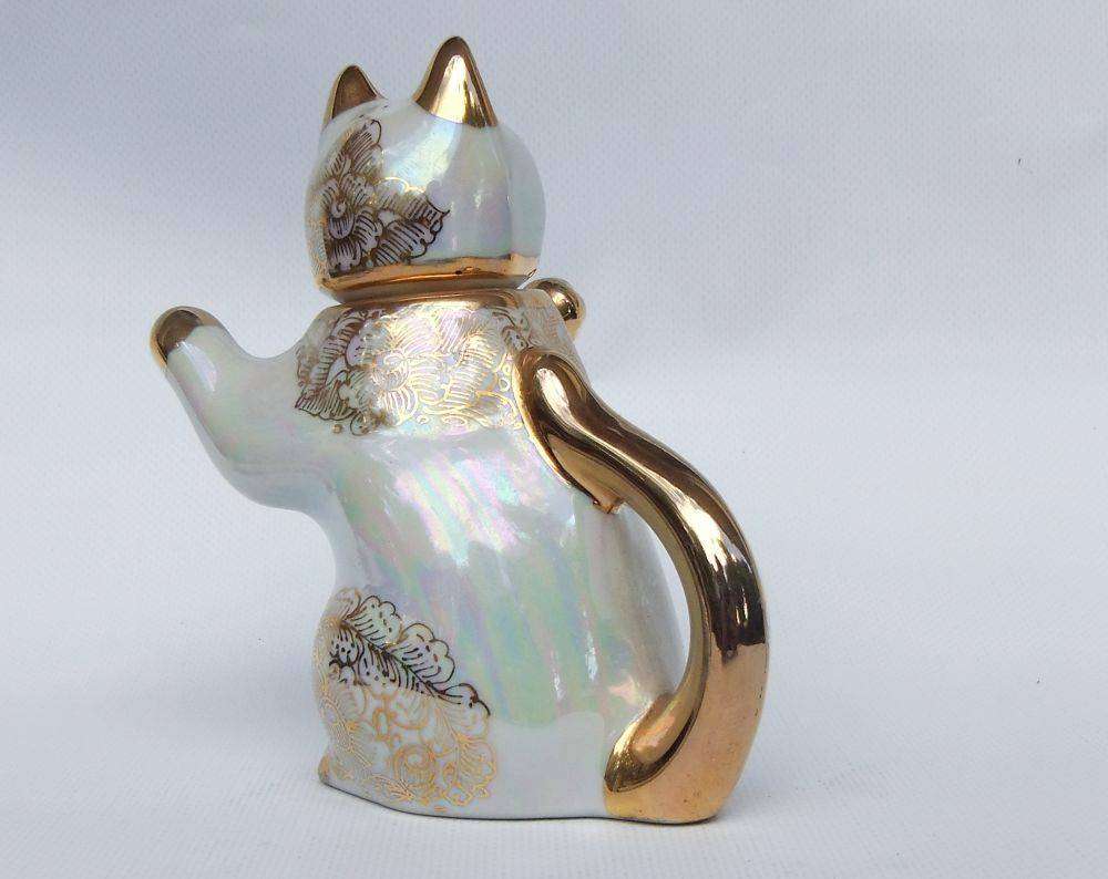 An adorable vintage hand painted porcelain kitty cat themed drink set with rainbow lustre