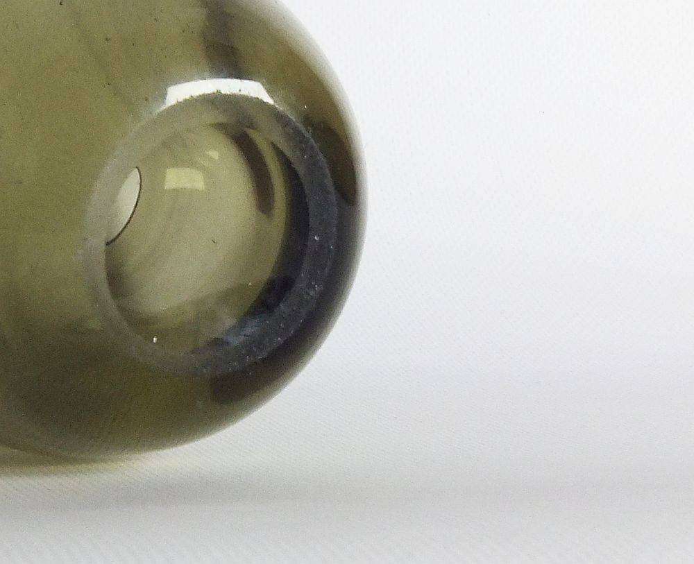 A heavy vintage Holmegaard style glass vase with polished base