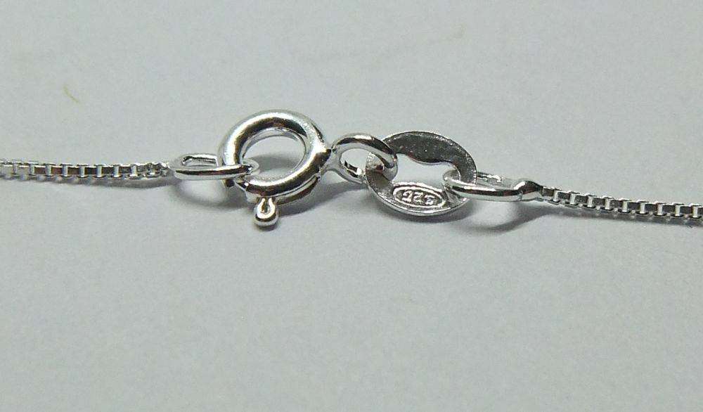 A vintage sterling silver Cancer Zodiac sign pendant plus a sterling silver necklace