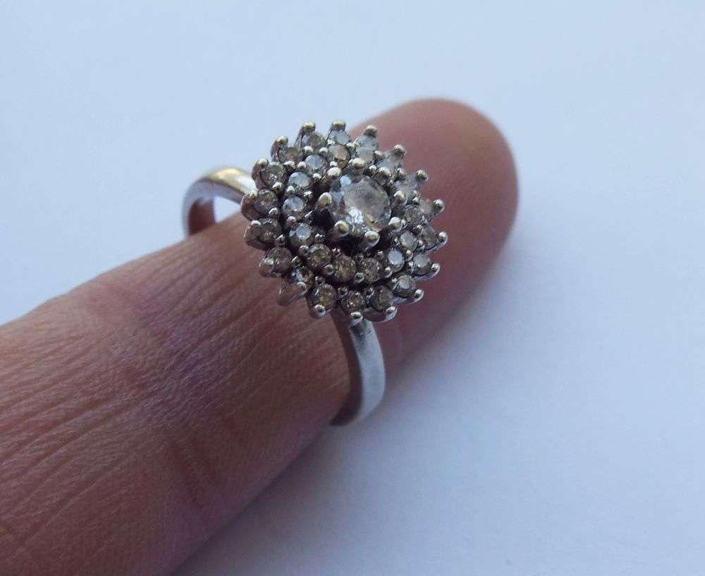 LOOK !! AN AMAZING SOLID STERLING SILVER CLUSTER RING SET WITH LOTS OF FACETED CZ STONES !! WOW !!