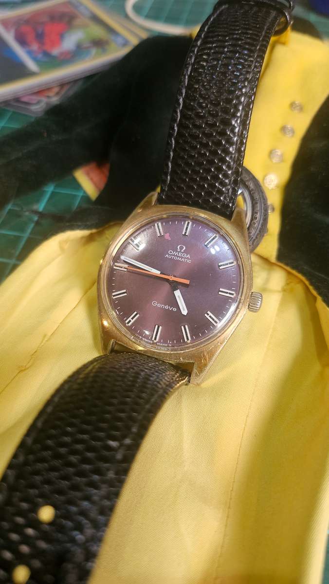 Stunning oxblood mens 38mm Omega Geneve