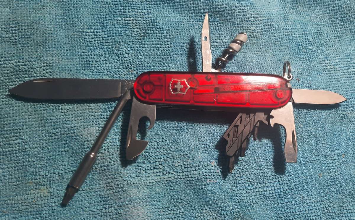 Victorinox Swiss Army knife Cyber Tool S 91mm Translucent Red scales Condition and tools as per pict