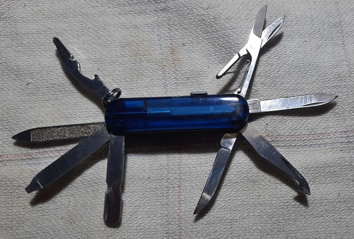 Victorinox Swiss Army Knife - Blue Translucent scales Midnight Mini Champ condition as per pictures