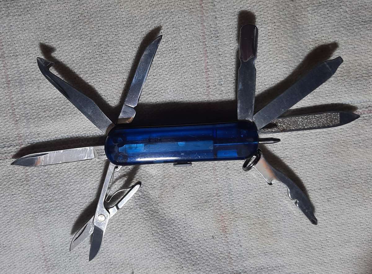 Victorinox Swiss Army Knife - Blue Translucent scales Midnight Mini Champ condition as per pictures
