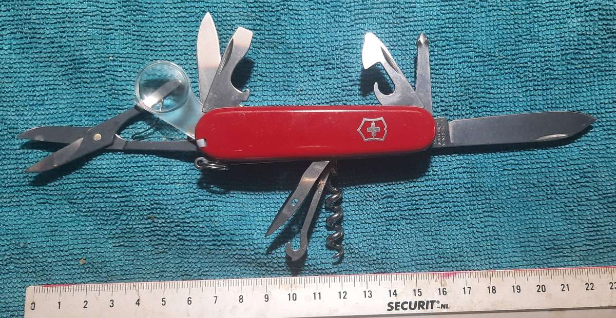 Victorinox - Explorer with Red Scales good condition