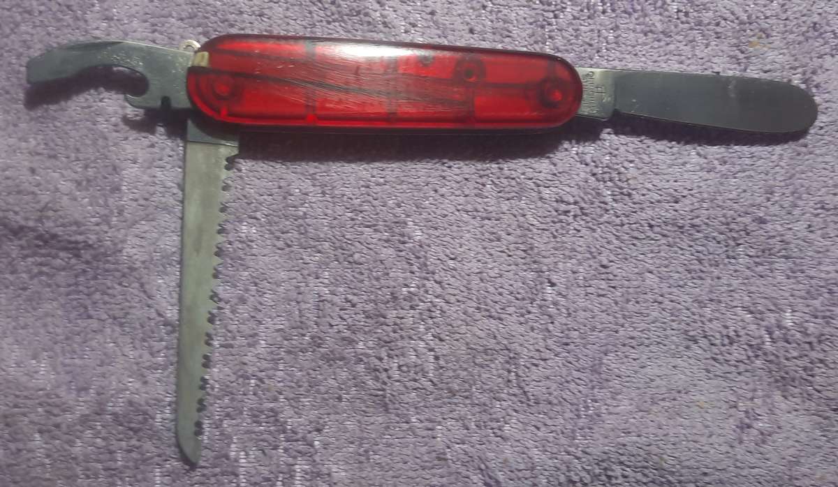 Victorinox Swiss Army Knife - My First Victorinox  Red Translucent  Scales condition as per pictures