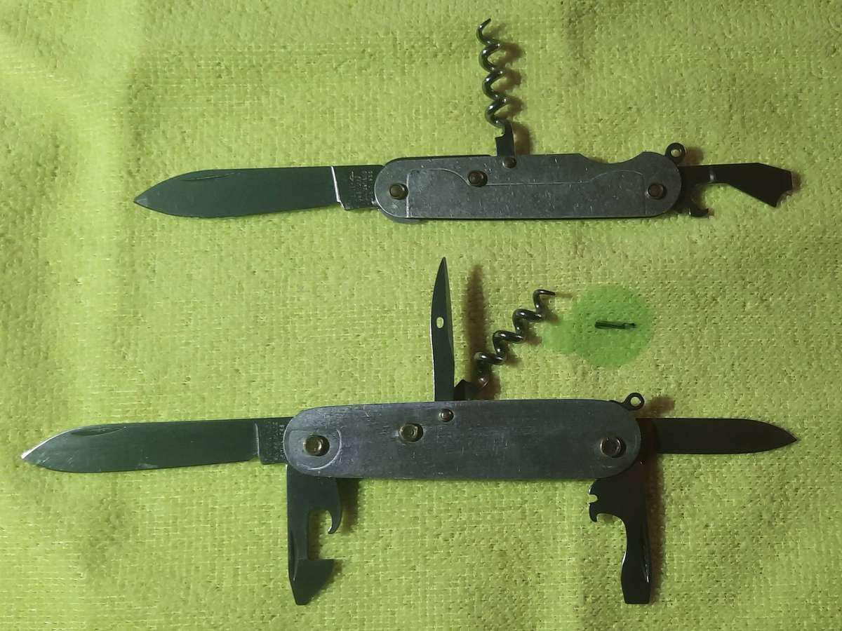 Victorinox - as per pictures two bodies with blades no scales