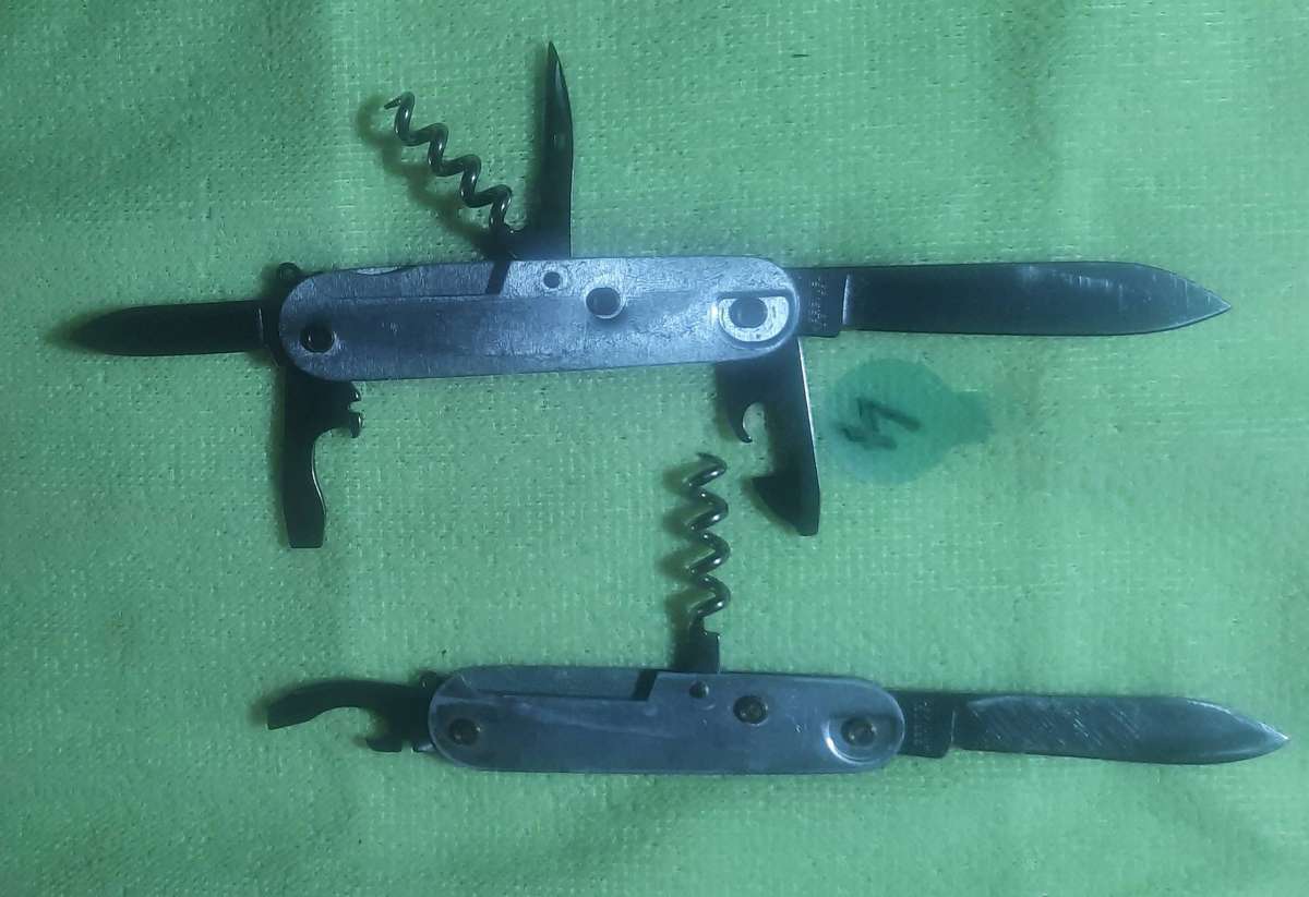 Victorinox - as per pictures two bodies with blades no scales Swiss Army Knife