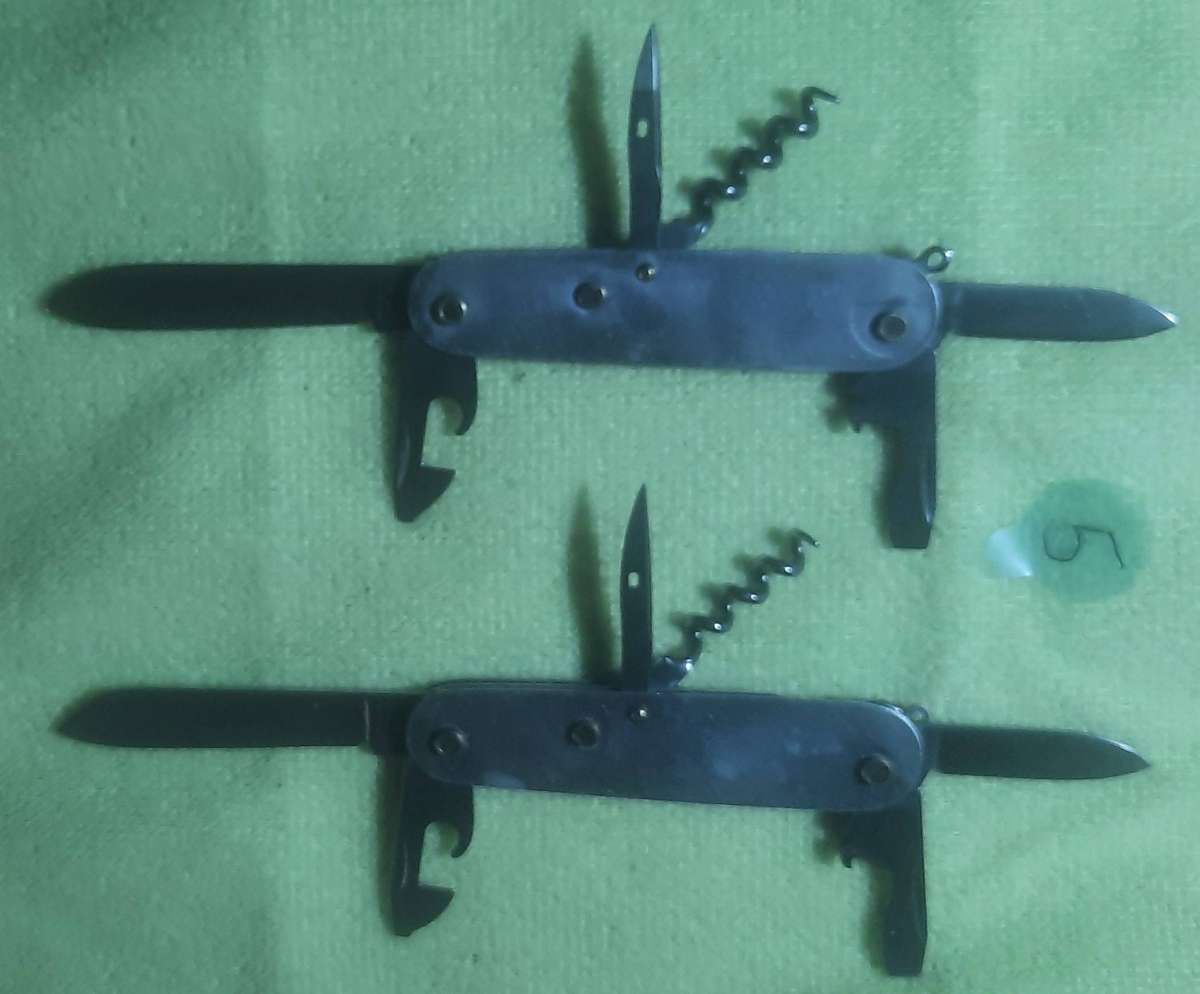 Victorinox - as per pictures two bodies with blades no scales Swiss Army Knife