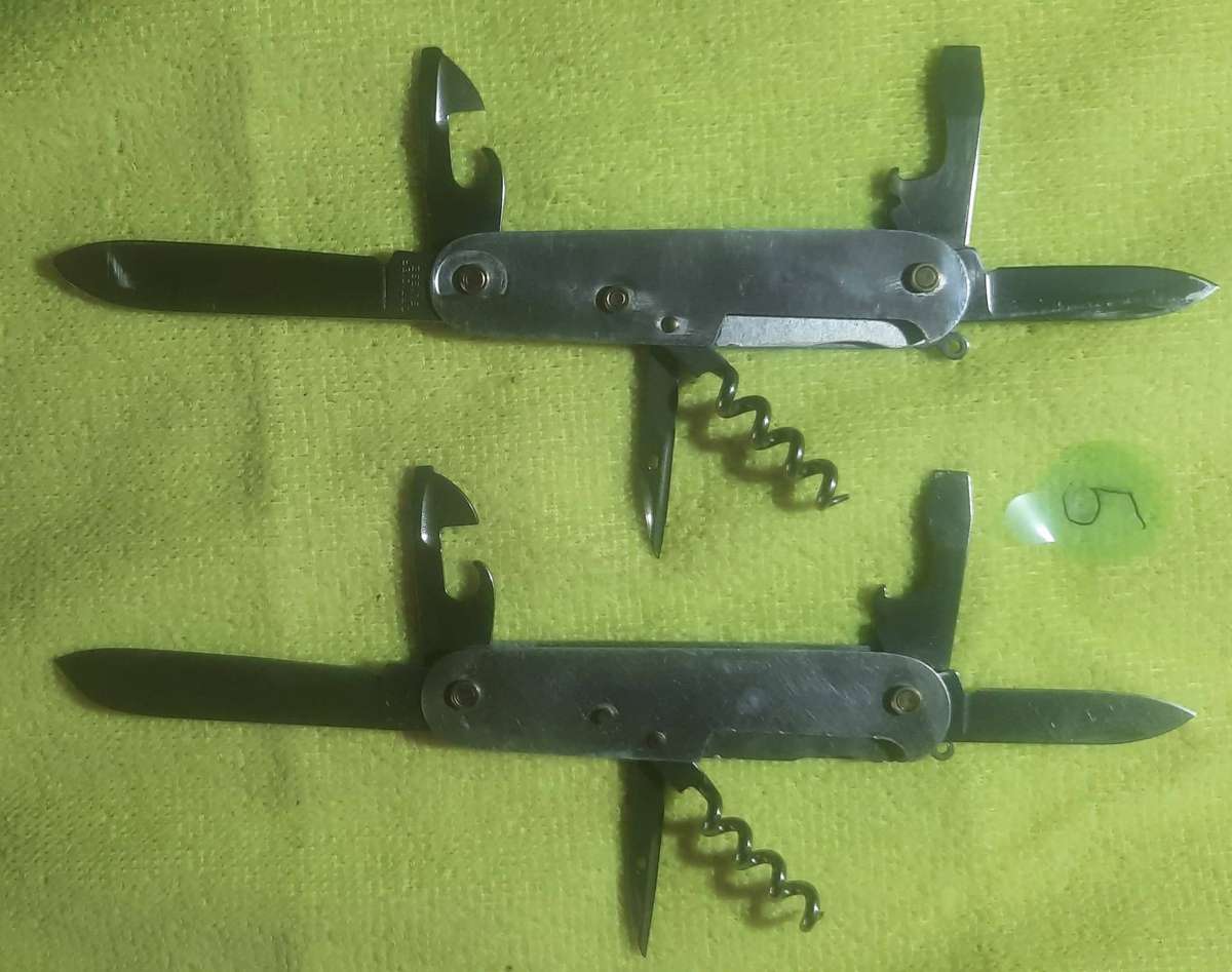 Victorinox - as per pictures two bodies with blades no scales Swiss Army Knife