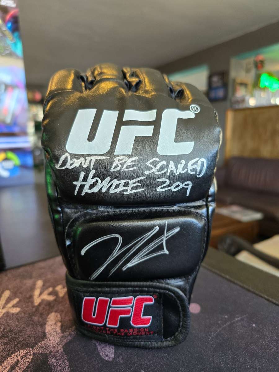 Signed and Inscribed UFC Glove - Nick Diaz - Includes COA