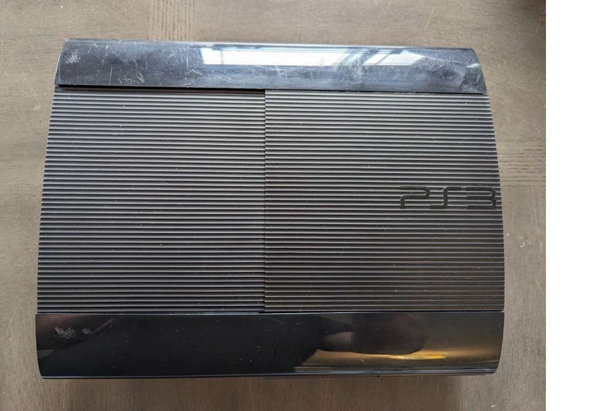 PLAYSTION 3 SUPER SLIM WITH 1 TB HARD DRIVE FOR SPARES.