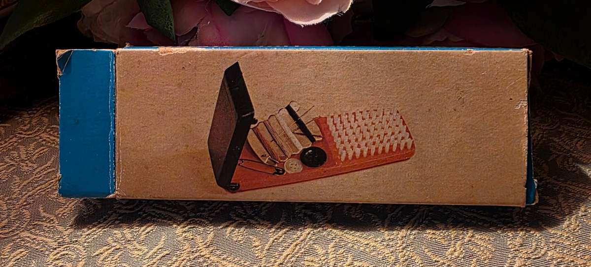 Brush with sewing supplies, retro