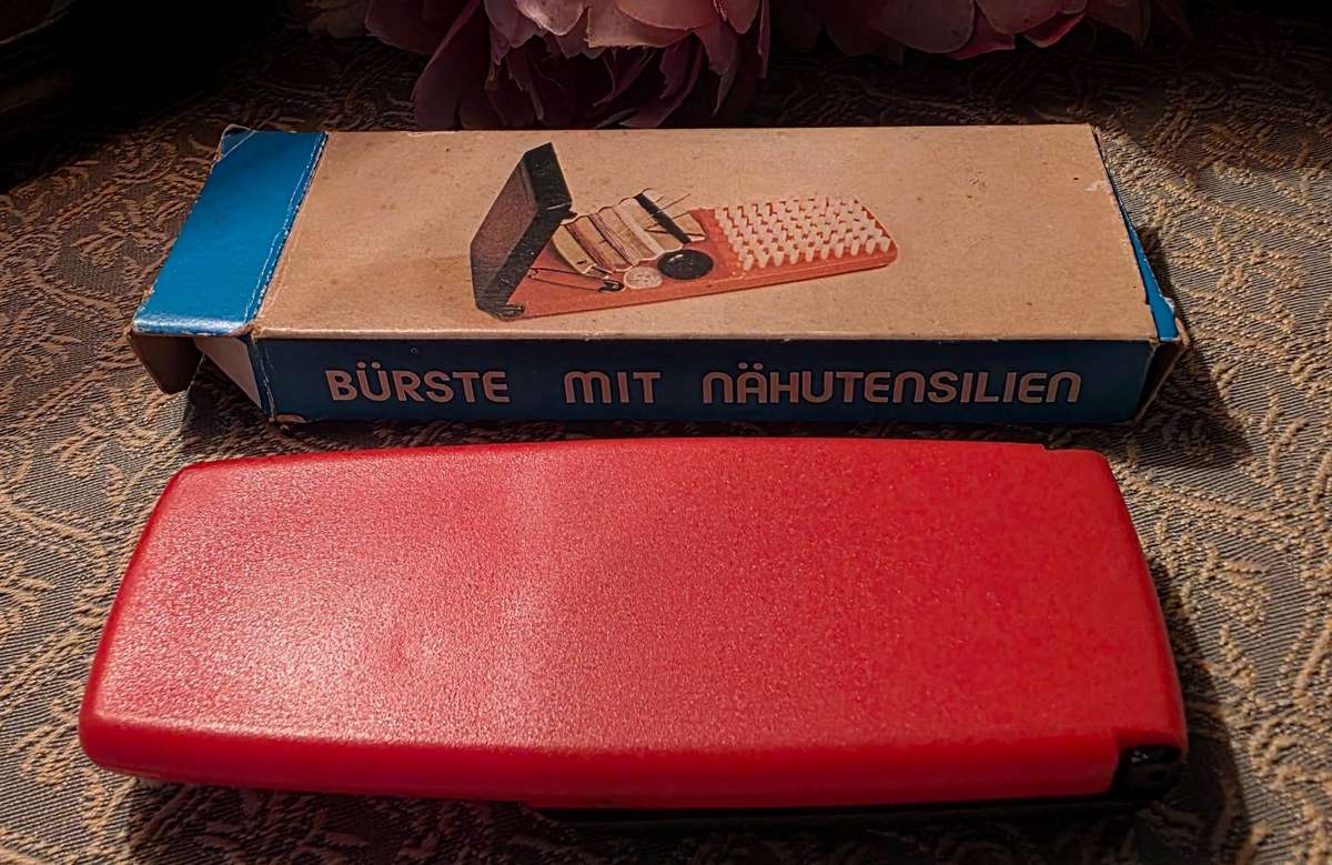 Brush with sewing supplies, retro