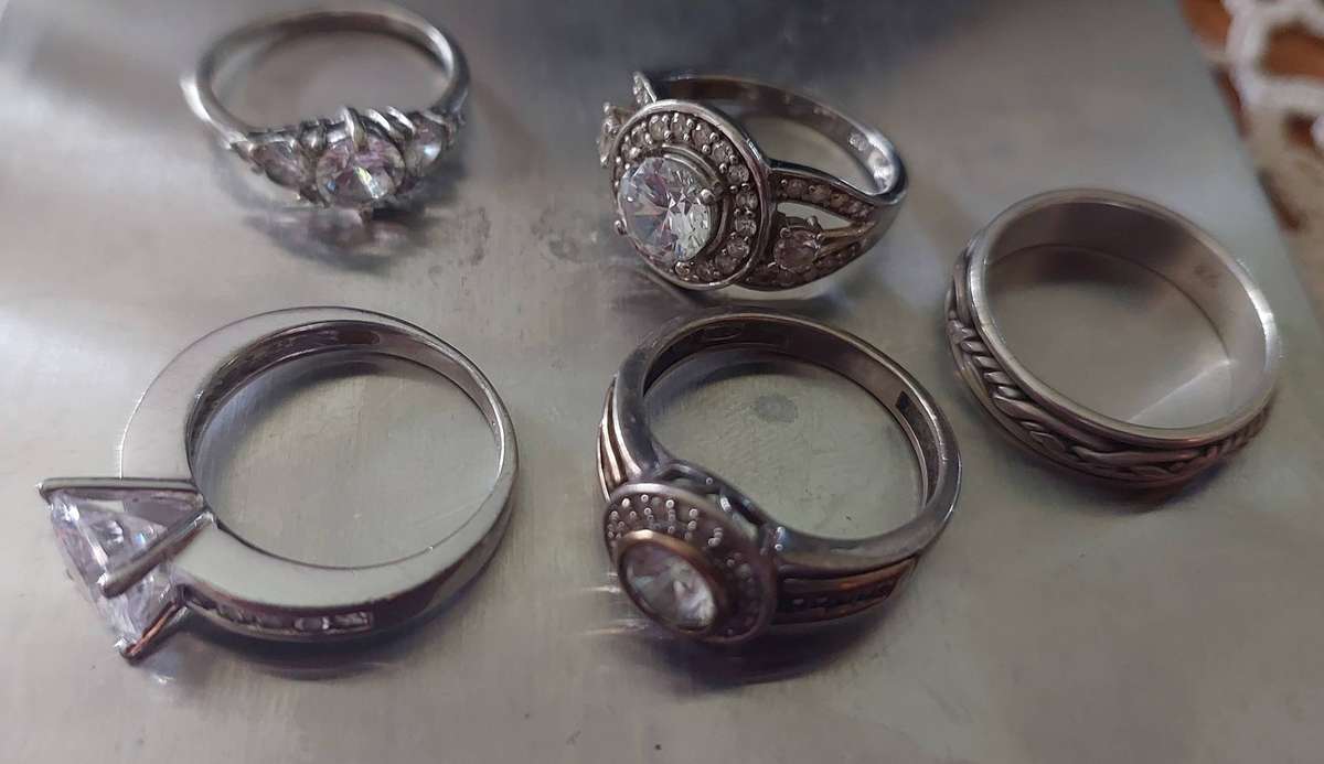 Five sterling silver rings
