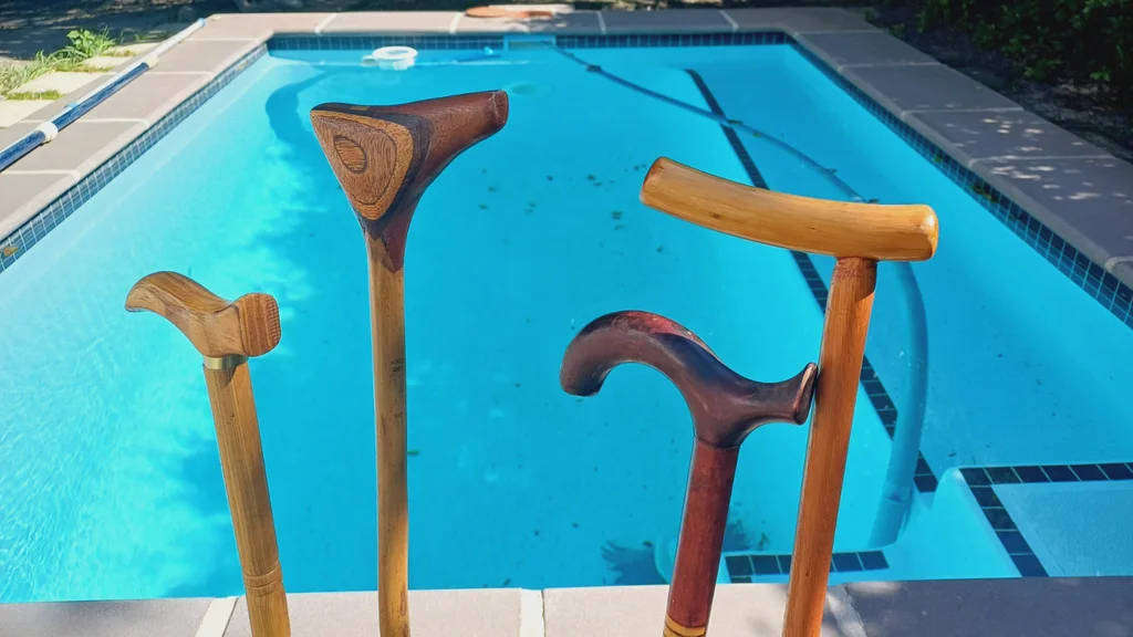 4 Vintage wooden walking sticks.  Price for all