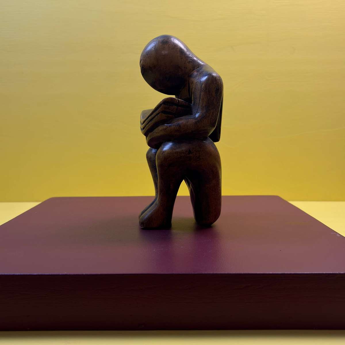 Abstract Wood Sculpture of a Man with a Book