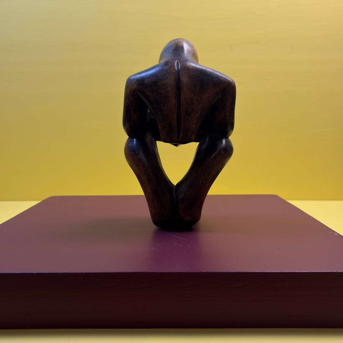 Abstract Wood Sculpture of a Man with a Book