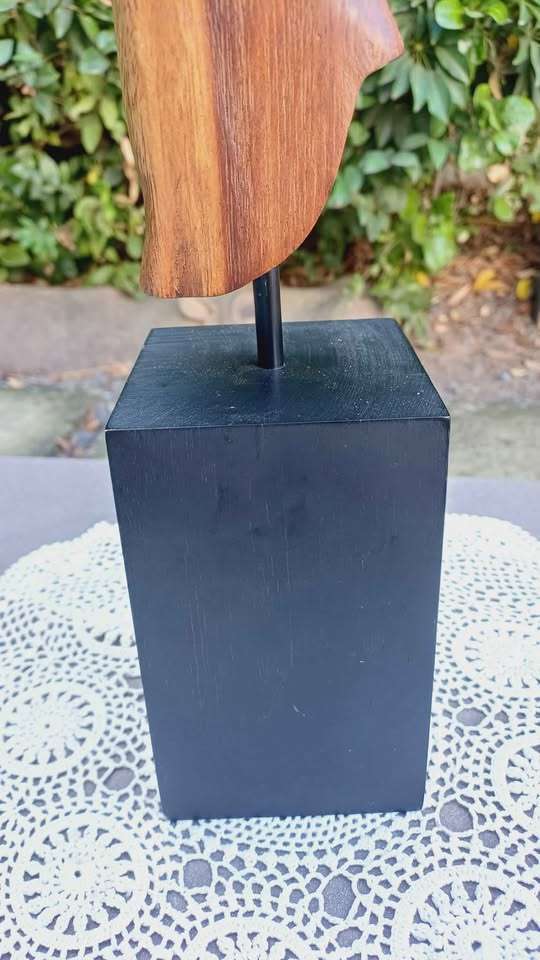 Elegant wooden abstract female figure on pedestal