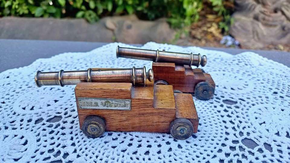 Pair of miniature brass cannons