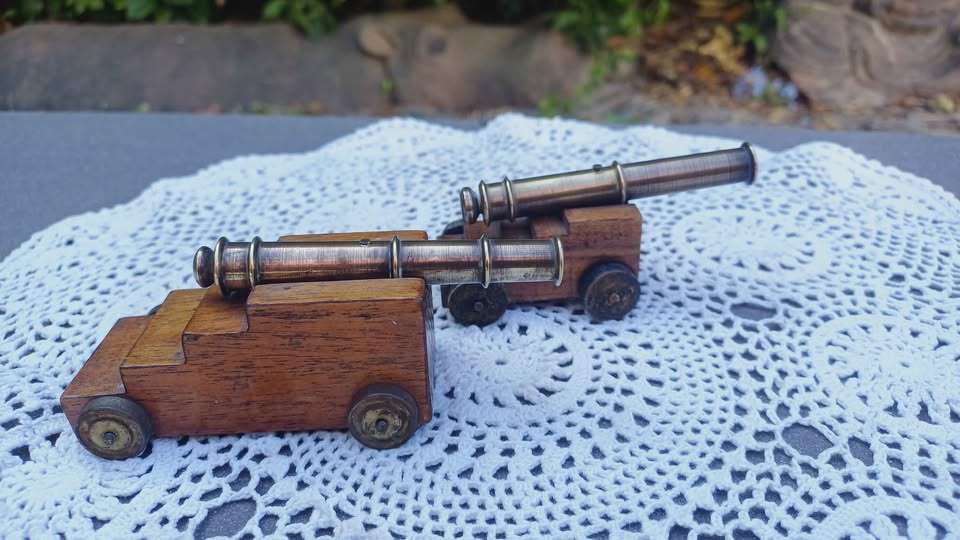 Pair of miniature brass cannons