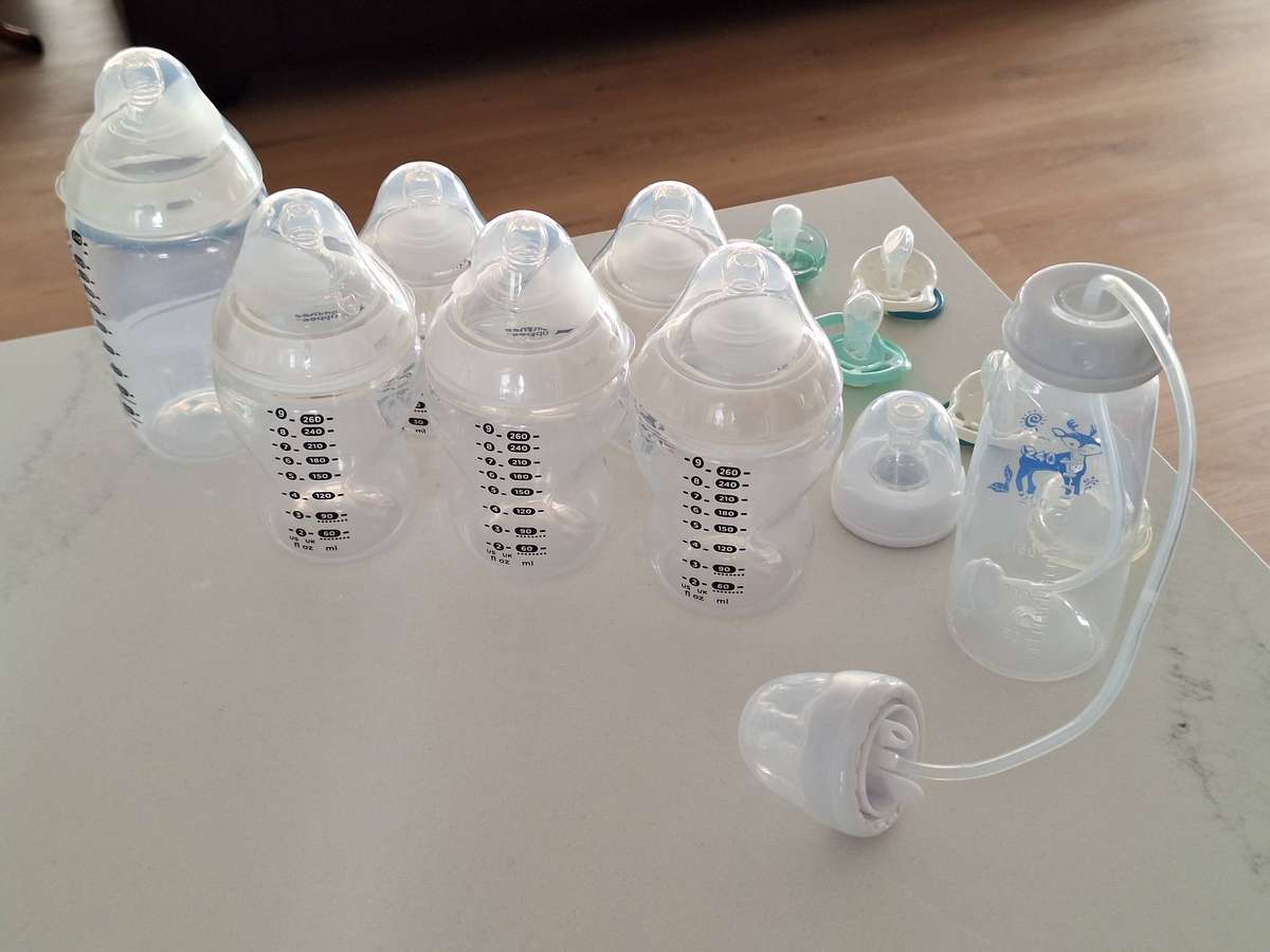 Like new Tommee Tippee bottles & dummies