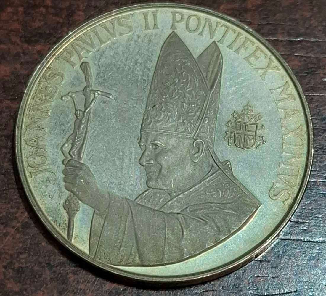 commemorative medal or token featuring Pope John Paul II