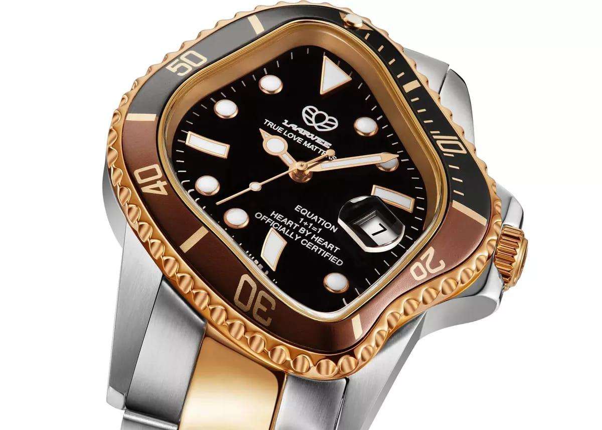 Laarvee Golden watch. It features a gold and silver band, a black dial, and bezel with brown