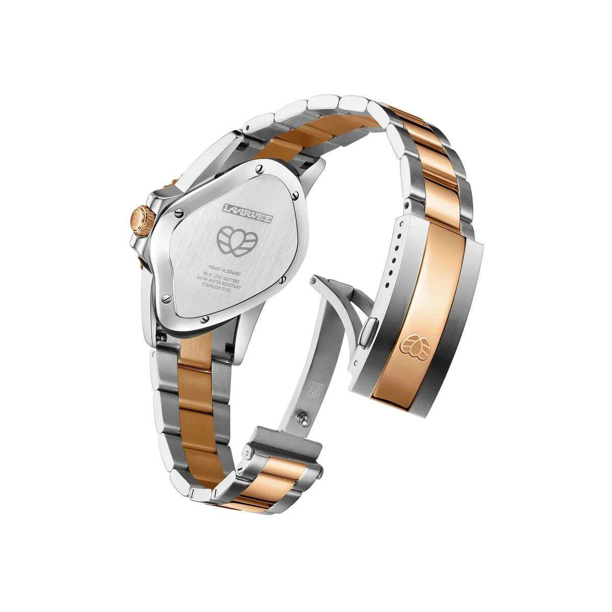 Laarvee Golden watch. It features a gold and silver band, a black dial, and bezel with brown