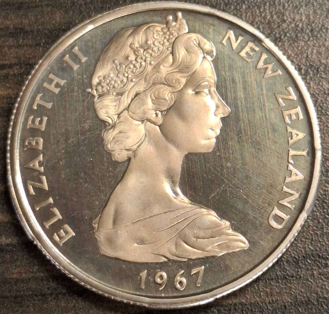 1967 New Zealand 50c coin featuring Queen Elizabeth II.