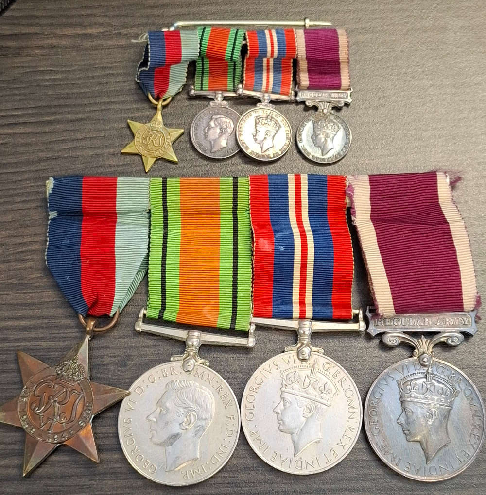 group of British World War II medals and miniature set