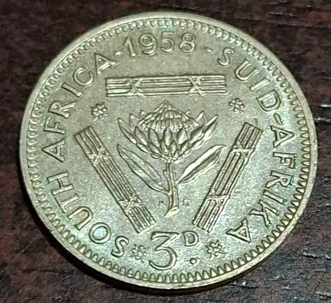 1958 South African Threepence coin, also known as a "tickey,"