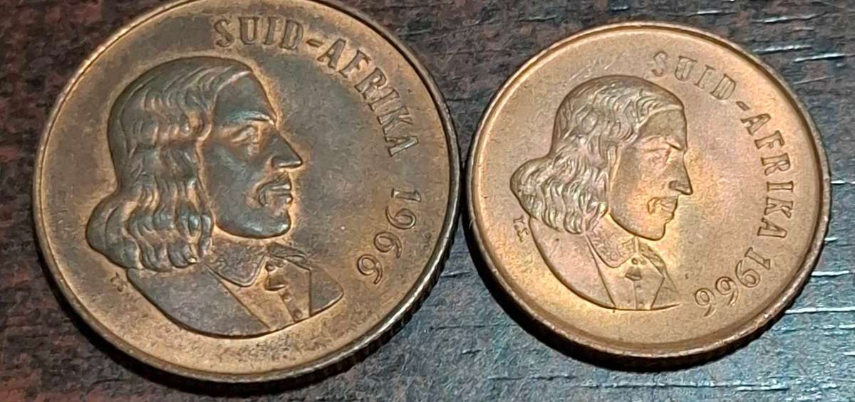 1966 2-cent coin and a 1-cent coin