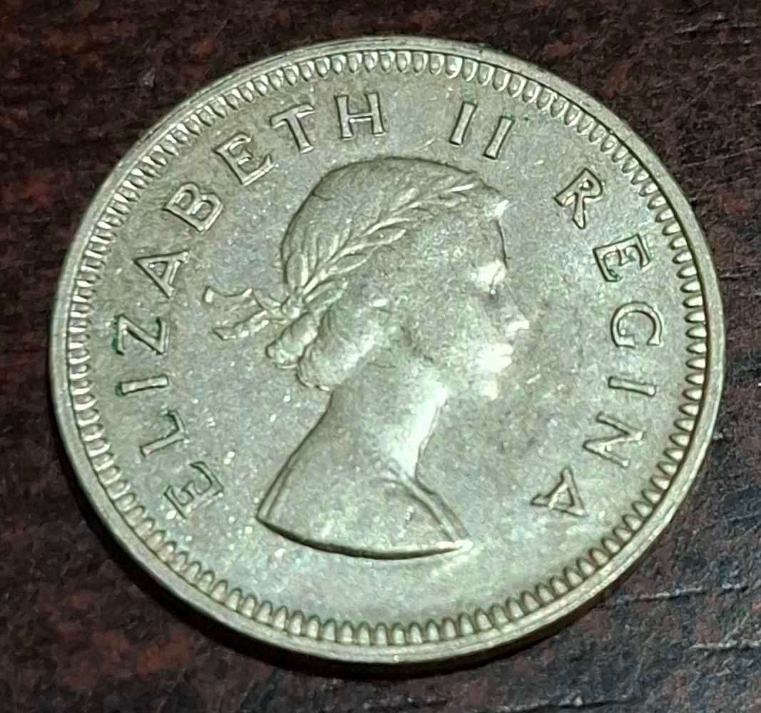 1958 South African Threepence coin, also known as a "tickey,"