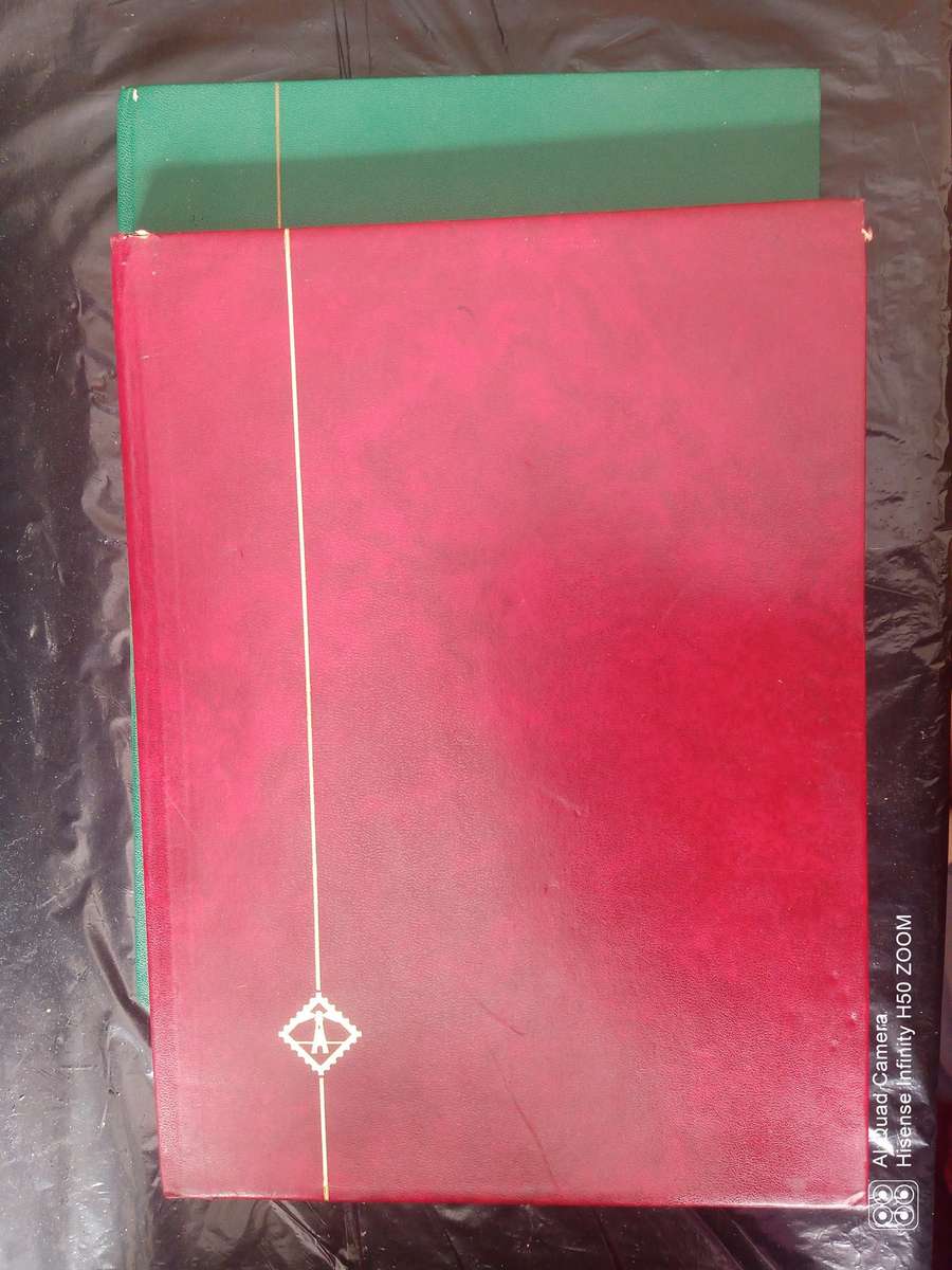 Rhodesia, Nyasaland & Zimbabwe in 2 x 8 pages stock books