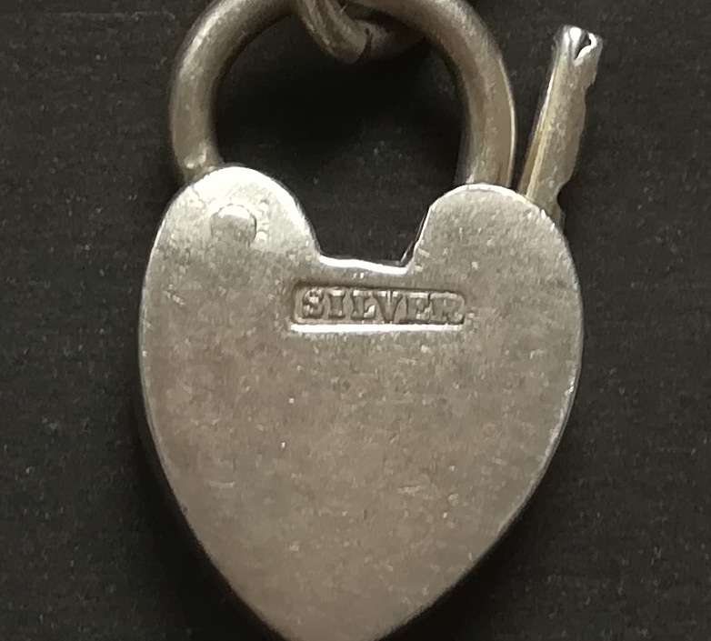 STERLING SILVER CHARM BRACELET WITH  HEART LOCK 180MM 18.1 GRAMS
