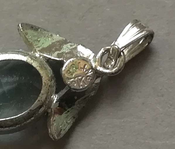 STERLING SILVER AND BLUE GLASS? VAN DELL PENDANT 10X20MM