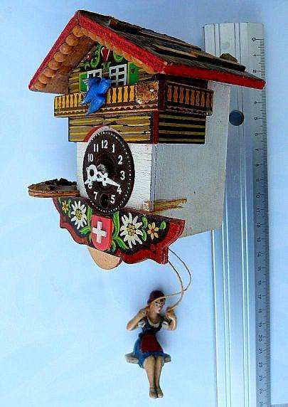 SWISS WALL CLOCK, SWINCING GIRL, MOVING BIRD. PLS SEE DESCRIPTION