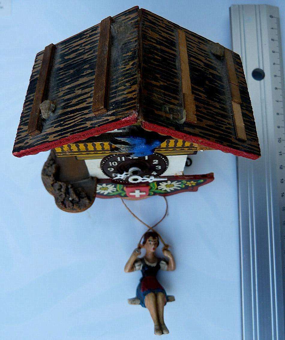 SWISS WALL CLOCK, SWINCING GIRL, MOVING BIRD. PLS SEE DESCRIPTION